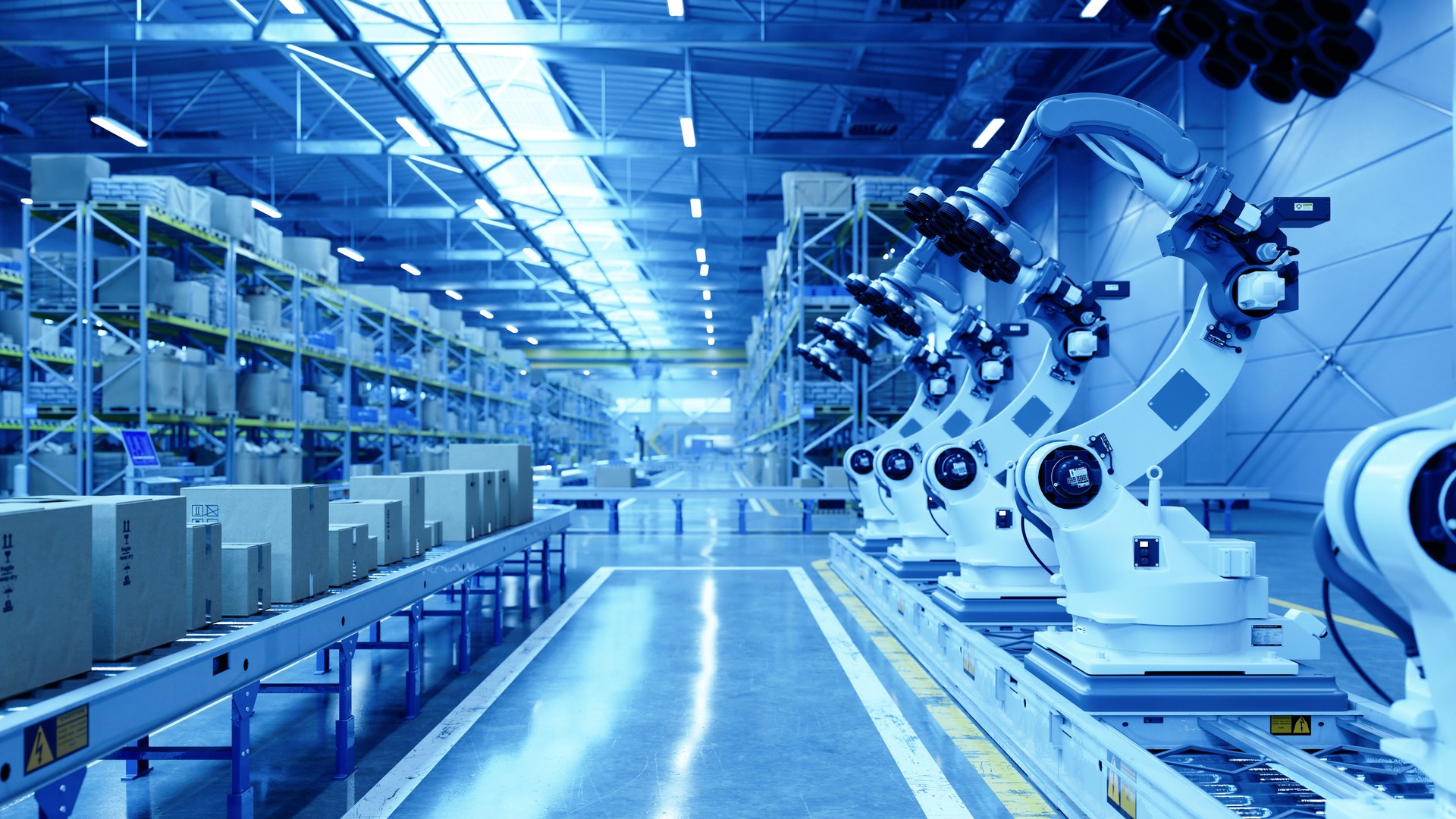 Robotic Arms in a Modern Warehouse with Blue Toned Lighting